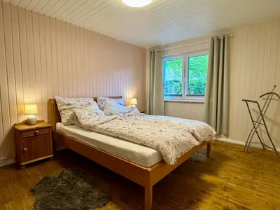 Ein Bett oder Betten in einem Zimmer der Unterkunft Meridiamus 2 - Ferienhäuschen in Boddennähe