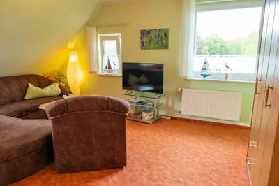 Ein Sitzbereich in der Unterkunft Urlaubs-Appartement am Dorfrand