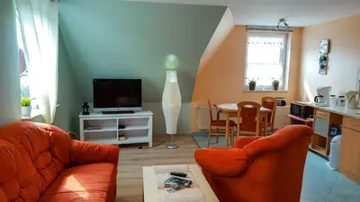 Ein Sitzbereich in der Unterkunft Ferienwohnung am Dorfrand