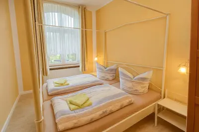 Ein Bett oder Betten in einem Zimmer der Unterkunft Bernstein 21