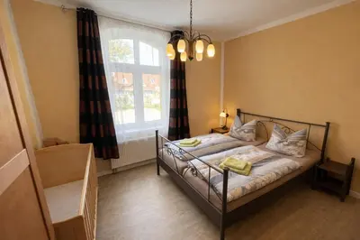 Ein Bett oder Betten in einem Zimmer der Unterkunft Ostseebad 22