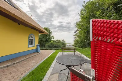 Ein Garten an der Unterkunft Gästehaus Bergfalke