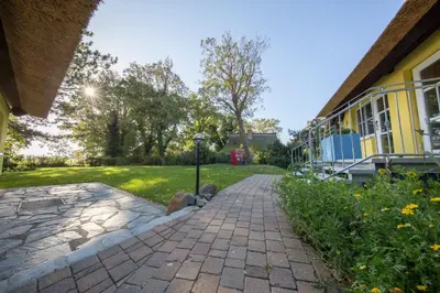 Ein Garten an der Unterkunft Gästehaus Bergfalke