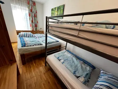 Ein Bett oder Betten in einem Zimmer der Unterkunft Dünengras