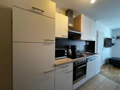 Küche/Küchenzeile in der Unterkunft Dünengras