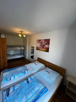 Ein Bett oder Betten in einem Zimmer der Unterkunft Dünengras