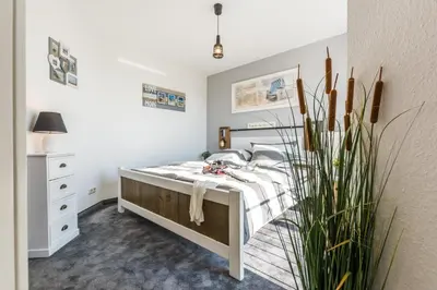Ein Bett oder Betten in einem Zimmer der Unterkunft Klosterstrasse 14 a Whg 13