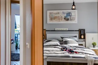 Ein Bett oder Betten in einem Zimmer der Unterkunft Klosterstrasse 14 a Whg 13