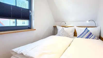 Ein Bett oder Betten in einem Zimmer der Unterkunft Haus Sonnenschein