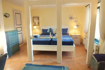 Ein Bett oder Betten in einem Zimmer der Unterkunft Ferienwohnungen im Klönhus