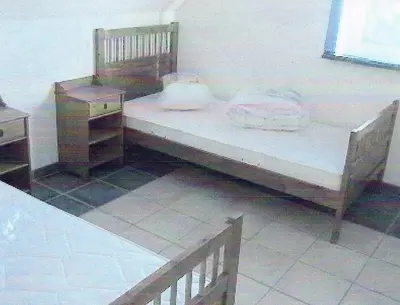 Ein Bett oder Betten in einem Zimmer der Unterkunft Meerblau