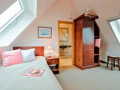 Ein Bett oder Betten in einem Zimmer der Unterkunft Bine Ferienhaus
