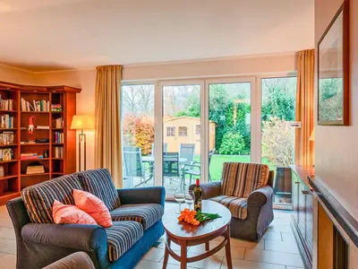 Ein Sitzbereich in der Unterkunft Bine Ferienhaus