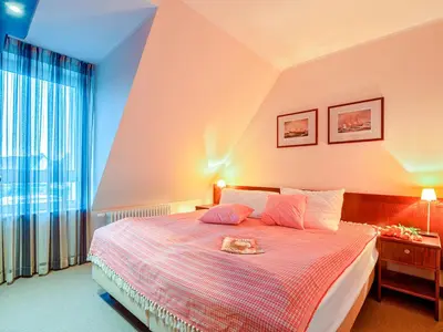 Ein Bett oder Betten in einem Zimmer der Unterkunft Bine Ferienhaus