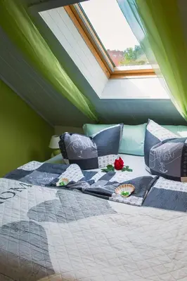 Ein Bett oder Betten in einem Zimmer der Unterkunft Lütt Matten