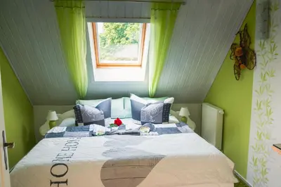 Ein Bett oder Betten in einem Zimmer der Unterkunft Lütt Matten