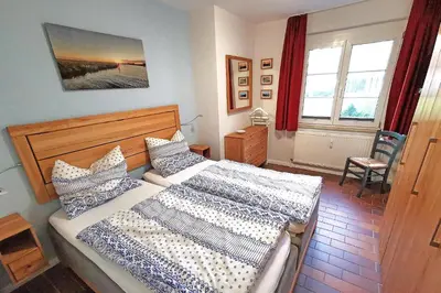 Ein Bett oder Betten in einem Zimmer der Unterkunft Ferienwohnung Sonnenstrahl
