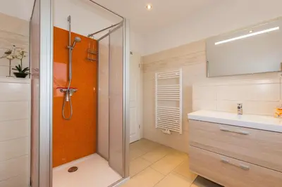 Ein Badezimmer in der Unterkunft Ferienhaus - Deichweg 10