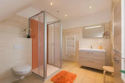 Ein Badezimmer in der Unterkunft Ferienhaus - Deichweg 10