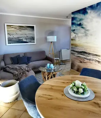 Ein Sitzbereich in der Unterkunft UNSERE PERLE IM ZENTRUM von Zingst MIT SÜDTERRASSE