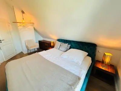 Ein Bett oder Betten in einem Zimmer der Unterkunft Wohnung Hafenblick