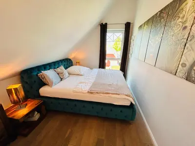 Ein Bett oder Betten in einem Zimmer der Unterkunft Wohnung Hafenblick