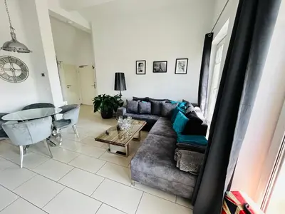 Ein Sitzbereich in der Unterkunft Wohnung Hafenblick