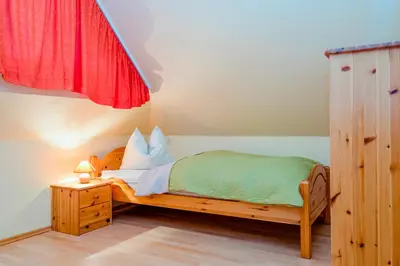 Ein Bett oder Betten in einem Zimmer der Unterkunft FH Käptn Jaconi