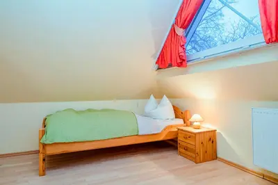 Ein Bett oder Betten in einem Zimmer der Unterkunft FH Käptn Jaconi