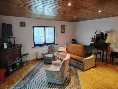 Ein Sitzbereich in der Unterkunft Ferienhaus Waldblick
