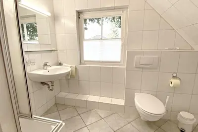Ein Badezimmer in der Unterkunft Zimmer 4