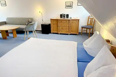Ein Bett oder Betten in einem Zimmer der Unterkunft Zimmer 4