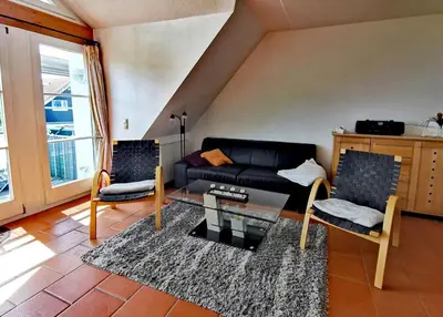 Ein Sitzbereich in der Unterkunft UNSERE PERLE MIT SAUNA UND BALKON in Zingst - Hund willkommen