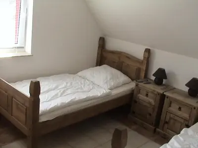 Ein Bett oder Betten in einem Zimmer der Unterkunft Abendsonne