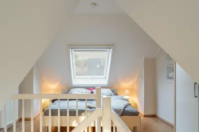 Ein Bett oder Betten in einem Zimmer der Unterkunft Müggenburger Weg 40 Wohnung 3 4