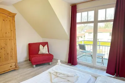 Ein Bett oder Betten in einem Zimmer der Unterkunft Holiday 2