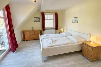 Ein Bett oder Betten in einem Zimmer der Unterkunft Holiday 2