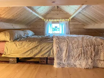 Ein Bett oder Betten in einem Zimmer der Unterkunft Tiny Häuschen Land-Idyll