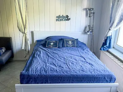 Ein Bett oder Betten in einem Zimmer der Unterkunft Ferienwohnung Wohlfühl-Anker