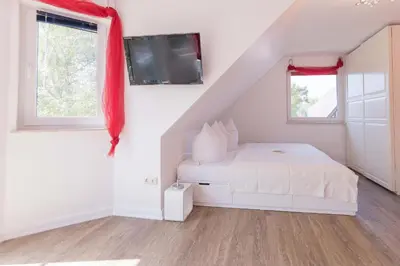 Ein Bett oder Betten in einem Zimmer der Unterkunft Ferienhaus ANNA