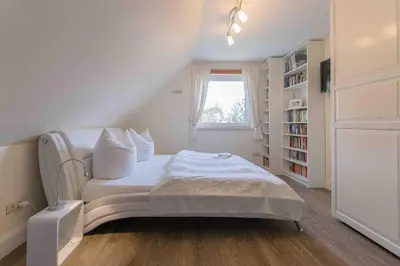 Ein Bett oder Betten in einem Zimmer der Unterkunft Ferienhaus ANNA