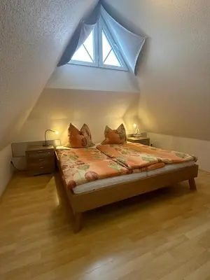 Ein Bett oder Betten in einem Zimmer der Unterkunft Mine Heimat Weg 11 Haus Seewolf