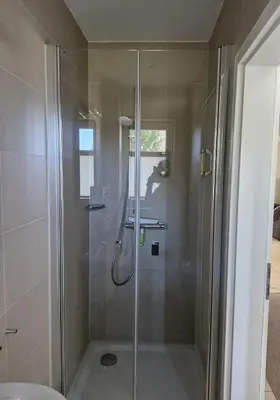 Ein Badezimmer in der Unterkunft STRANDROSE - 300m zum Strand