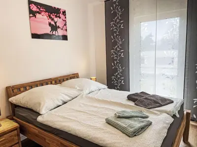 Ein Bett oder Betten in einem Zimmer der Unterkunft Holiday Home Der kleine Kranich by Interhome
