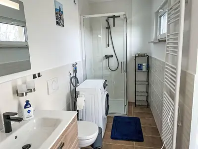 Ein Badezimmer in der Unterkunft Holiday Home Der kleine Kranich by Interhome