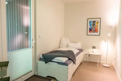 Ein Bett oder Betten in einem Zimmer der Unterkunft Ostseedomizil 