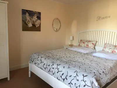 Ein Bett oder Betten in einem Zimmer der Unterkunft Ferienwohnung Strandgut