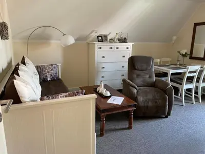 Ein Sitzbereich in der Unterkunft Ferienwohnung Strandgut