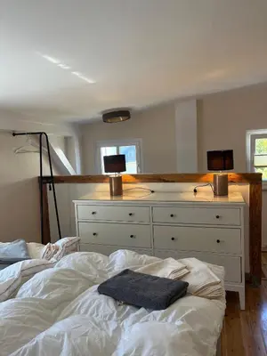 Ein Bett oder Betten in einem Zimmer der Unterkunft Gartenhaus