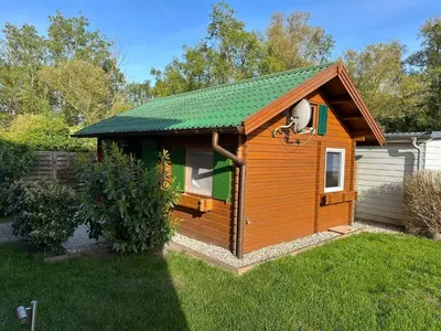 Ein Garten an der Unterkunft Bungalow am Hafen
